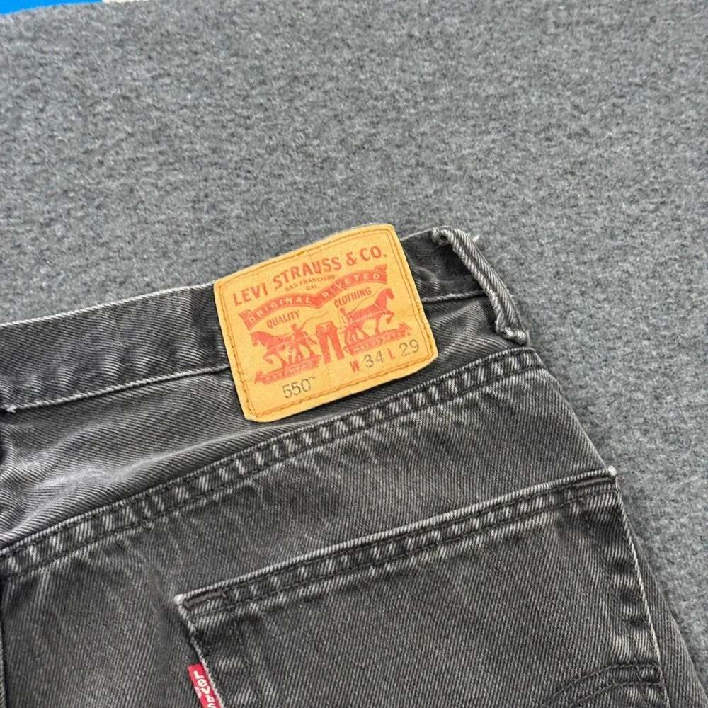 Vintage Levis 550 Relaxed Fit Jeans Mens 34x29 Black Good Raw Hem Cutoff Capri